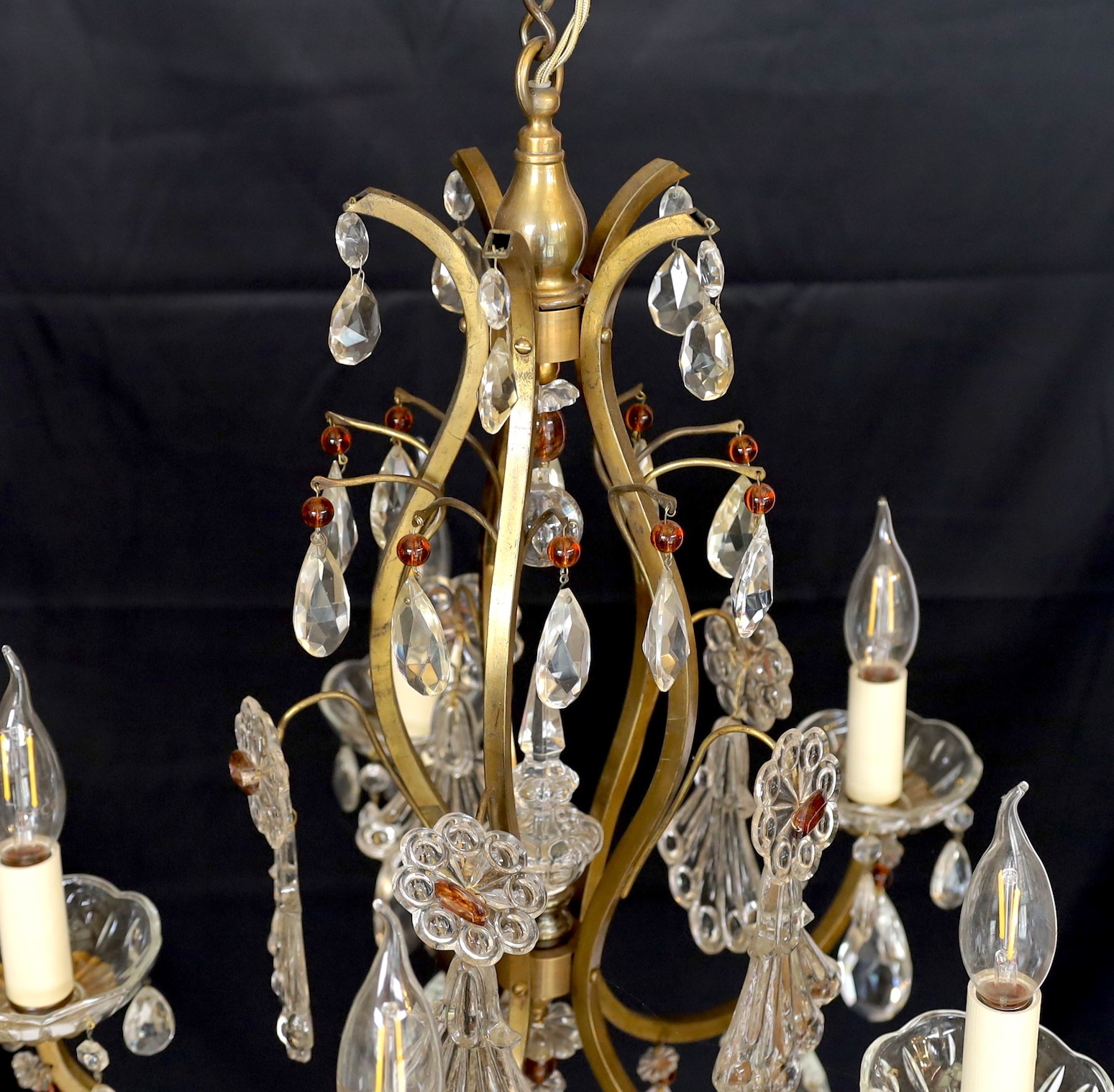 An early 20th century French bronzed metal and glass drop five light chandelier, height 63cm. width 48cm